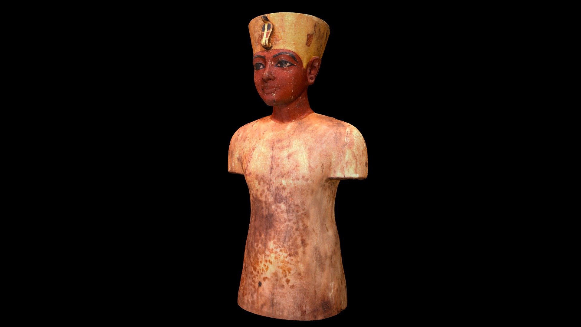 This life size mannequin of Tutankhamen was recovered from the antechamber of his tomb where it was sitting behind a pile of gilded chariot parts.  The mannequin is wood covered with plaster/gesso and painted. It is currently on display in the Egyptian Museum, Cairo, Egypt.

Created from 126 photographs (Canon EOS Rebel T5i and T7i) using Metashape 1.6.1.  It was photographed in January 2018 and January 2020.  The top of the crown was not captured adequetly enough during the photography and so is infilled with a solid color 3d model