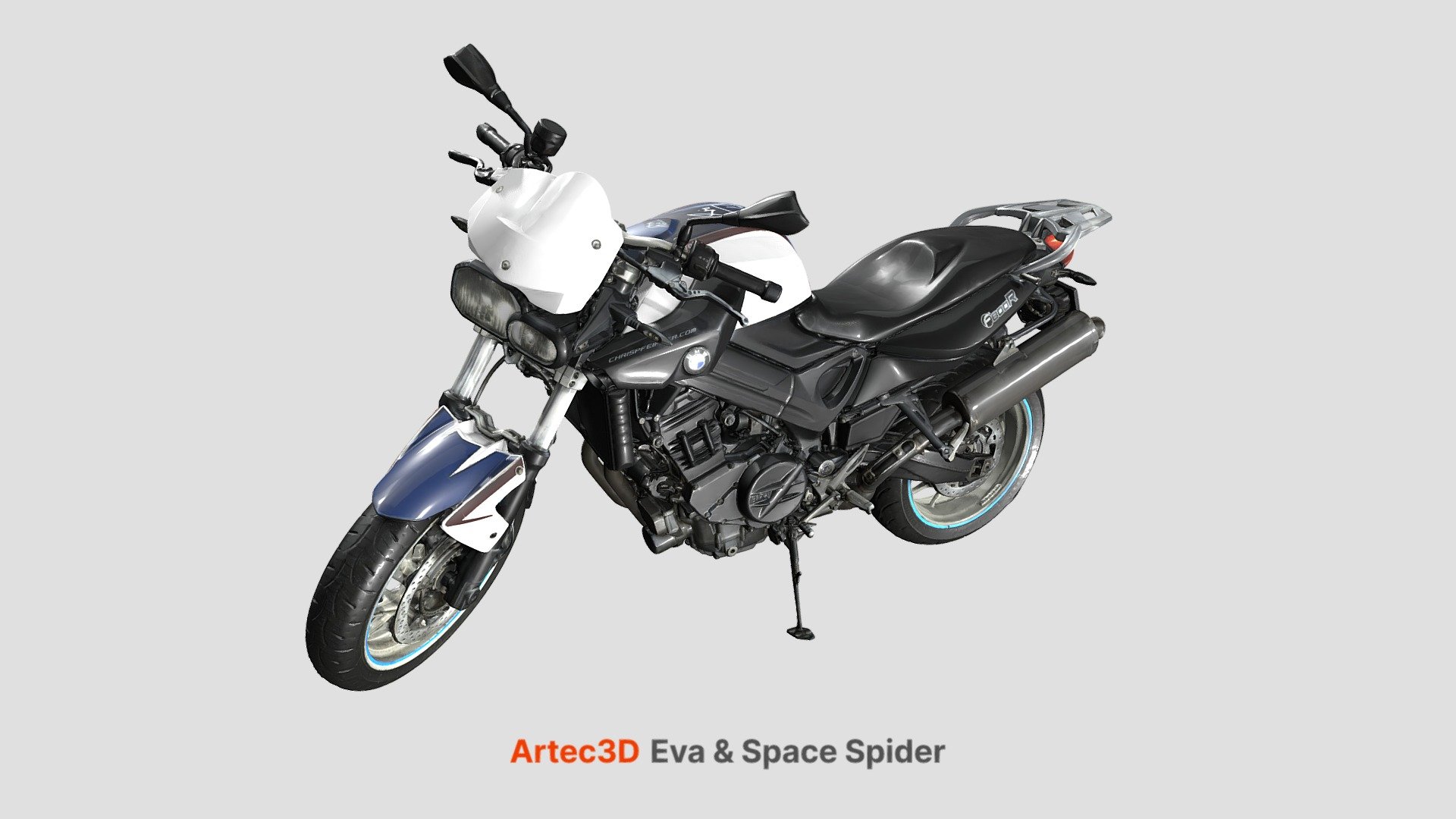 This motorcycle was scanned with both Eva and Space Spider. Eva allowed for fast and easy acquisition of the overall shape, while Space Spider was used to scan the intricate geometry of the wheels and the sides. We first sprayed the bike with anti-gloss spray. The seat and gas tank had no features, but we stuck a couple of pieces of masking tape to them and that was enough to ensure stable. We didn’t have to add an extra features to the parts we scanned with Space Spider since all of these mechanical parts had rich geometry. There were a lot of these parts though and the shapes were quite complex, consequently it took quite a long time to scan them all. One of the highlights of the scanning was the bike chain: due to its thin and repetitive shape, we expected it to be a challenging object, but Spider's scanning depth was deep enough to capture the background behind it.
Scanning time: Eva - 15 min. Space Spider - 1,5 hours
Processing time: 30 minutes for Eva data only, 3,5 hours for both Eva and Spider data