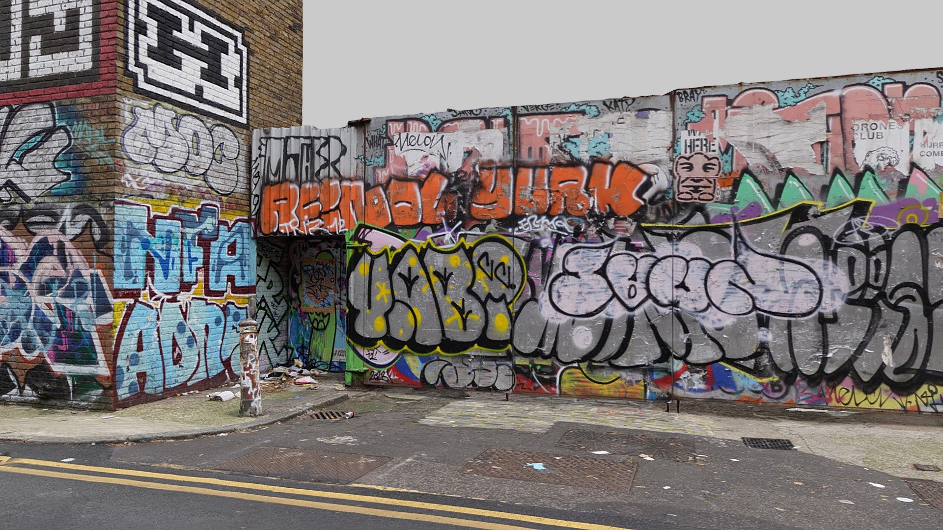 A graffiti covered wall and gate on the south side of Quaker Street, off Brick Lane, London.

The wall forms the northern boundary of the Truman Brewery Site.

1741 photos taken in September 2023 with a Sony a7R III and processed in Reality Capture.