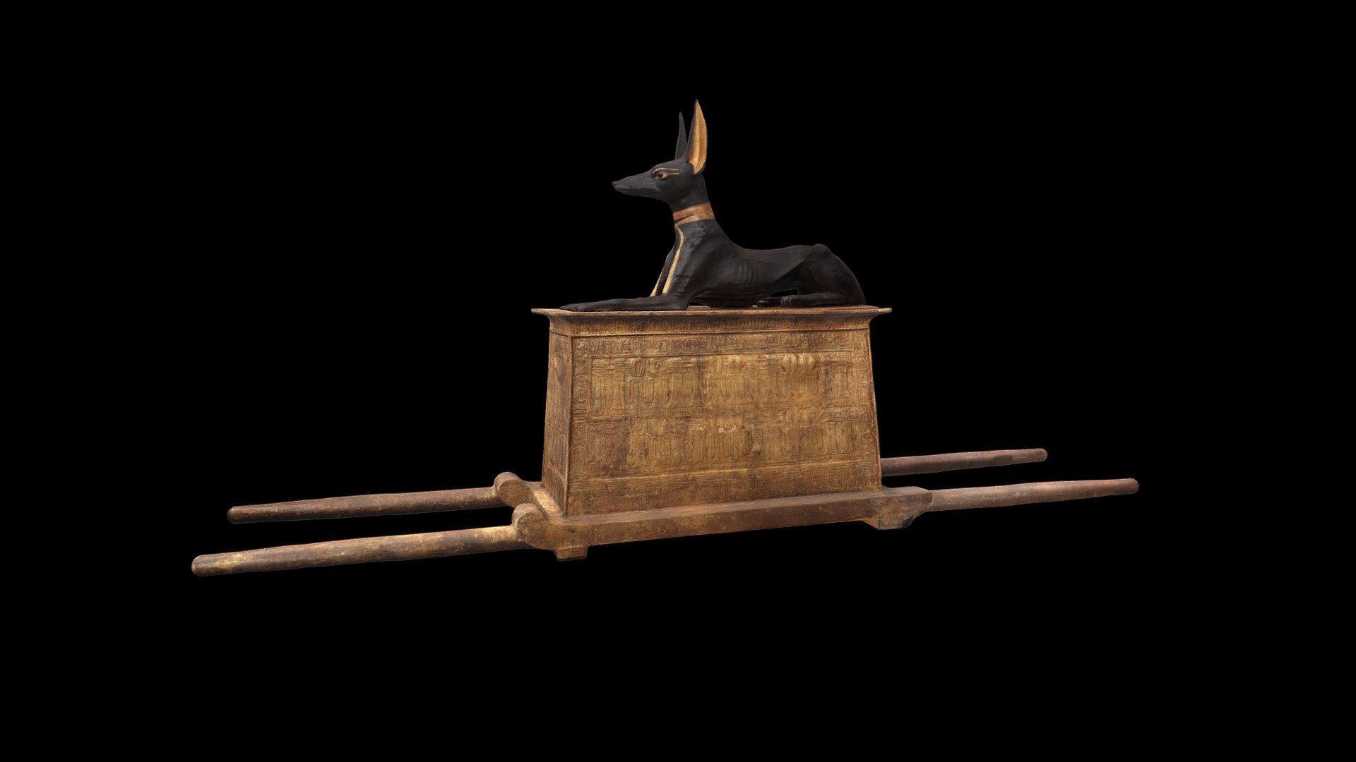 Gilt wood shine on carrying poles with a recumbant statue of Anubis on top recovered from the so called &ldquo;Treasury