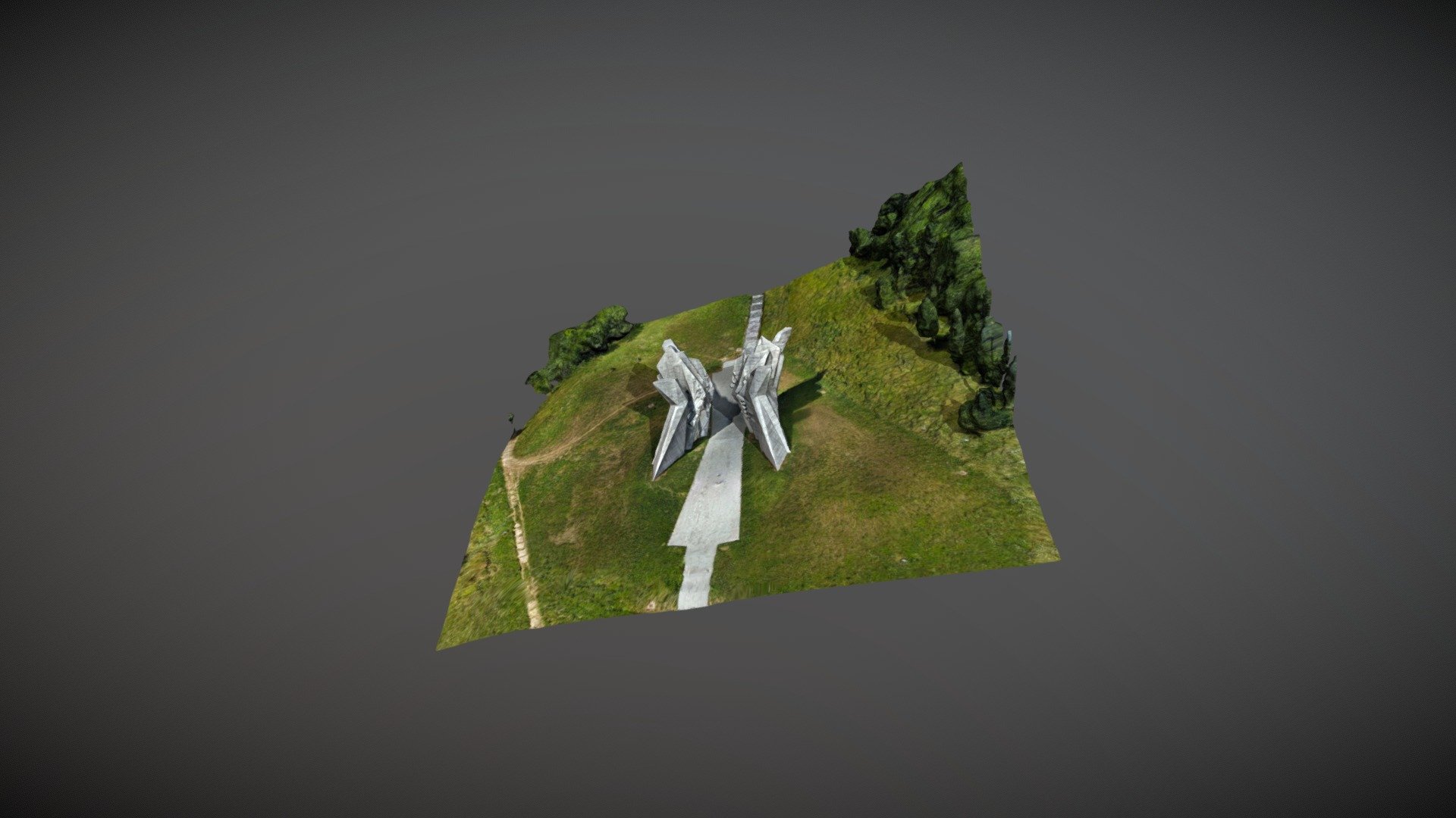 In the mid-1960s, a monument for fallen soldiers of the Battle of Sutjeska was designed by sculptor Miodrag Zivkovic. In the Valley of Heroes, Zivkovic set up a magnificent monument on the top of a hill. The monument enriched the space of the already famous ossuary, built in 1958 by architect Sakeb Hadzihalilovic, with the remaining bodies of 3301 Partisan soldier who died in the Schwarz operation. After two years of construction, Zivkovic's monument was ceremoniously opened in 1972. 

Wings of victory are placed on the top of the hill so that the entire valley of the Sutjeska River can be seen. The valley, bearing blood and suffering of less than a century old battle, is now protected by a magnificent white monument. On the one hand, all of the monument's representativity is attained by the environment and nature itself, but on the other hand, any man walking by it will be left curious 3d model